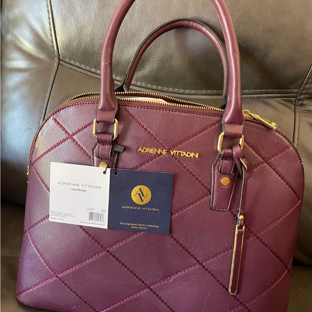 Adrienne Vittadini maroon purse with gold zippers
